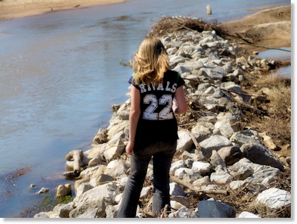 Haley walking on the rocks.